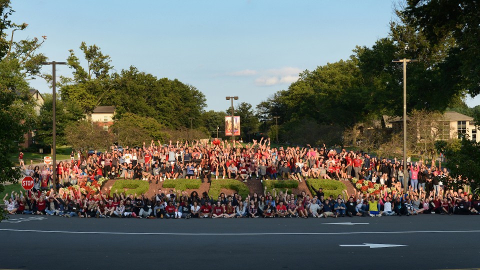 Group of students representing the class of 2021 on the berm