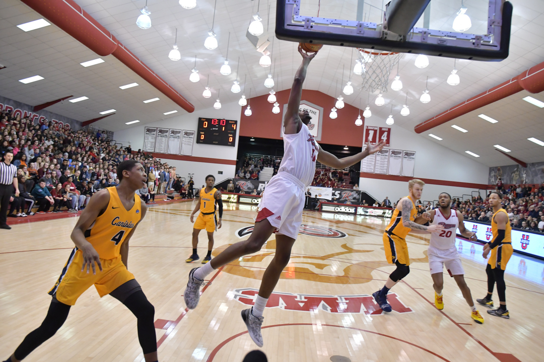 Basketball play in Rider Gym.