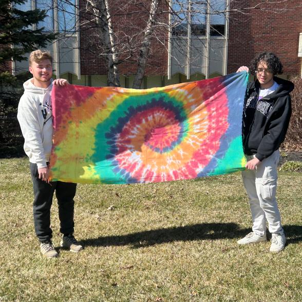 Project Summer students with tie dye towel - business in action project