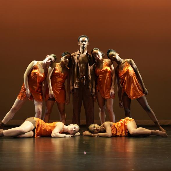 Dancers in orange.