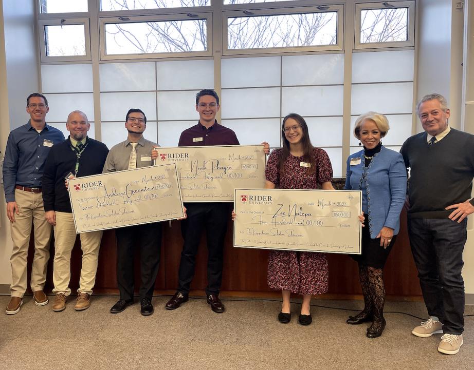 Presentation of Checks at Koppelman scholar event