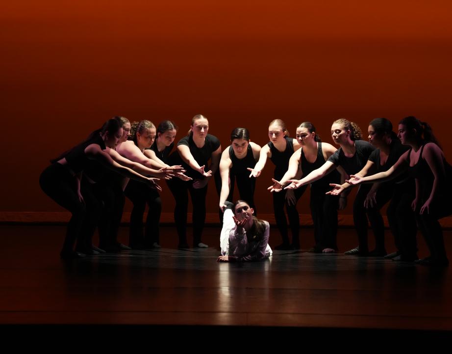 dancers with dramatic lighting