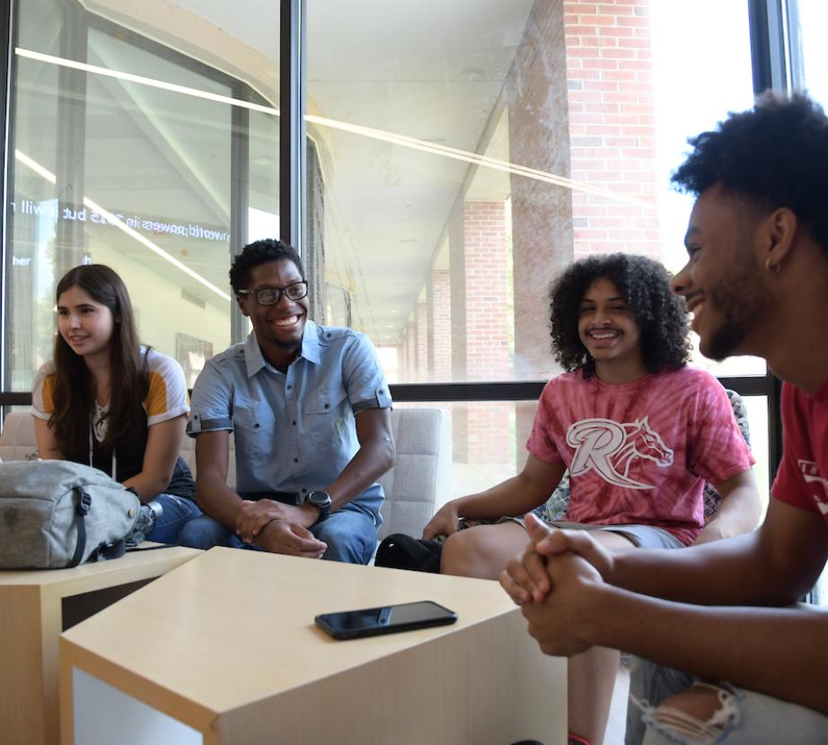 Group of students seated together in conversation