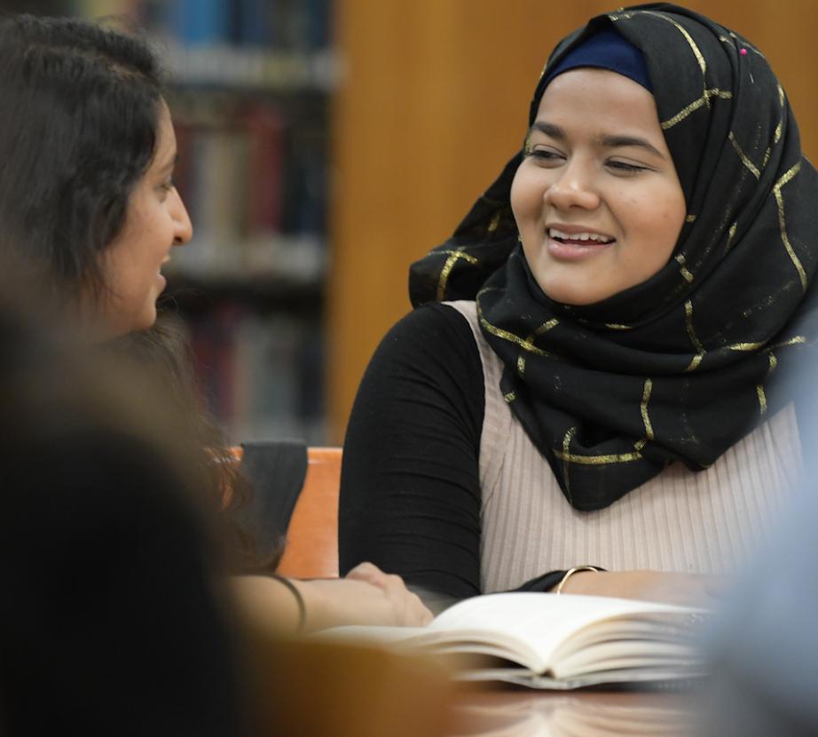 two students in a discussion